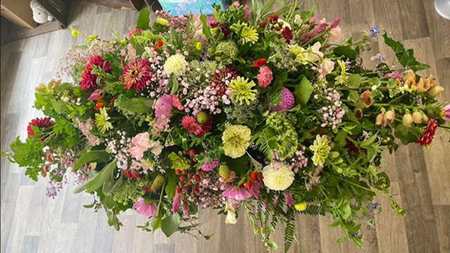 Natural & Rustic Double Ended Spray including local grown flowers - £250.00 onwards Content can vary with seasonal flowers in a display like this and what is growing naturally at different times of the year