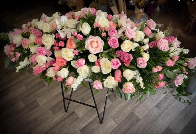 Large luxury pastel double ended spray - a mixture of pastel rose varieties with phalaenopsis orchids - £550.00 approximately 5ft