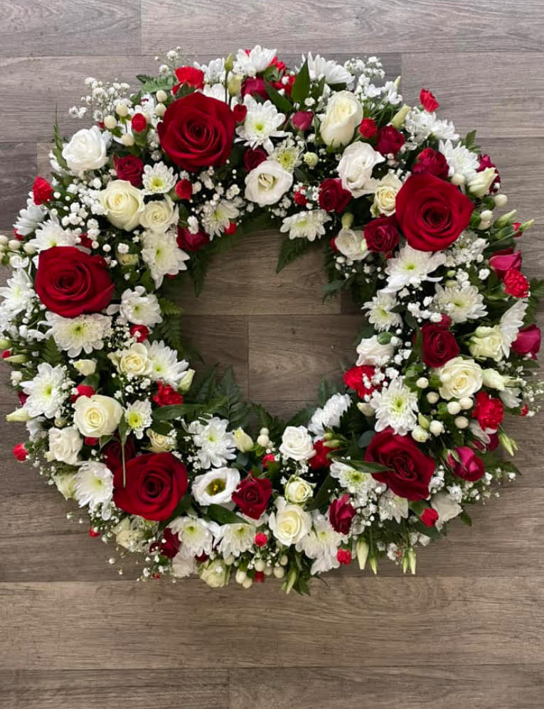 Red & White Wreath tribute - £85.00 approximately 16inches round